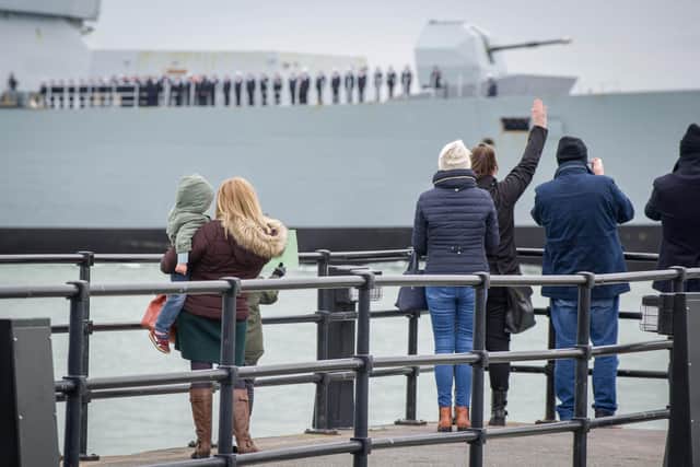 People waving at HMS Defender'screw.
Picture: Habibur Rahman