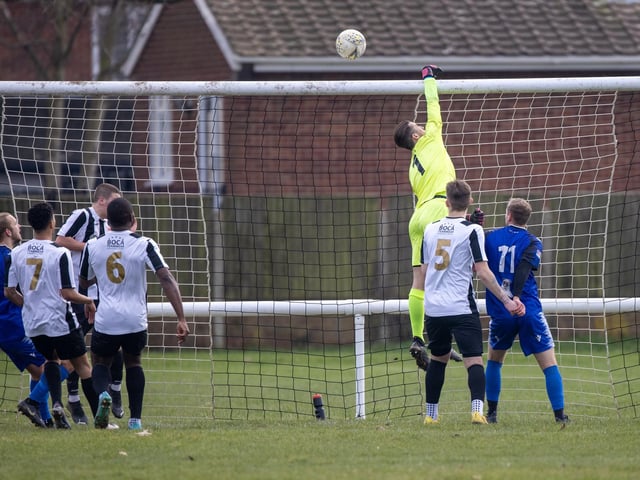 Hayling United (black/white) v Clanfield. Picture by Alex Shute