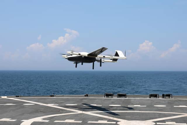 A drone currently being tested by the US Navy to deliver supplies is being used as the inspiration for the Royal Navy's own drone postmen ambitions. US. Navy photo by Bill Mesta.