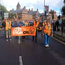 Just Stop Oil protestors carrying out a slow march in Southsea to spread their message about fossil fuels destroying the planet. Traffic was slowed down to a crawl. Picture: Just Stop Oil.