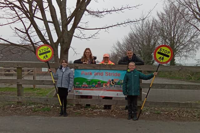 From left to right: Lilly Brightwell, Year 6 pupil and junior road safety officer, Stevie-Louise, acting head teacher, Phyliss Gamblin, school crossing patrol officer, Gary Applin, vice chair of governors, Bremnar Fawcett, Year 6 pupil and junior road safety officer.
