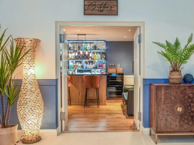 This property comes with five bedrooms, four reception rooms and three bathrooms as well as parking and a large garden.