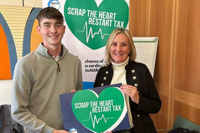 Dame Caroline Dinenage with teenager Jack Harley