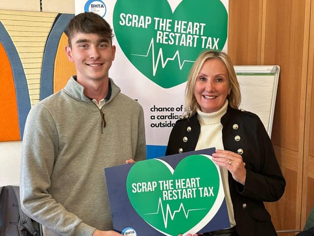 Dame Caroline Dinenage with teenager Jack Harley