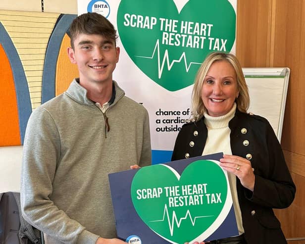 Dame Caroline Dinenage with teenager Jack Harley