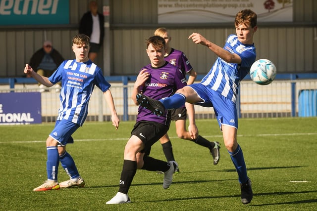 Action from the Portsmouth Youth League U15 Challenge Cup final between Bedhampton Youth (blue and white kit) and Gosport Falcons. Picture: Keith Woodland (190321-341)