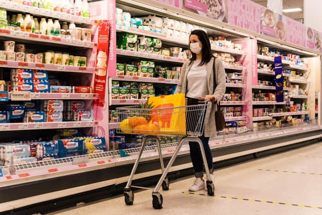 A shopper wearing a face covering in a Sainsbury's supermarket. Picture: Sainsbury's