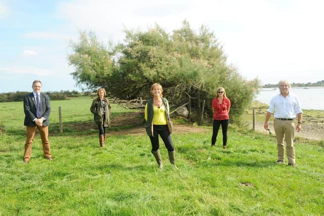 Environment Minister Rebecca Pow MP visited Warblington Farm in Havant which is set to become a nature reserve to reduce nitrogen pollution.Pictured is: (l-r) Cllr Gary Hughes, deputy leader of Havant Borough Council and cabinet lead for planning, Hayling seafront strategy and commercial services, SJ Hunt, Solent LEP director, Environment Minister Rebecca Pow, Anna Parry, partnership manager from Bird Aware Solent and Tony Juniper, chairman of Natural England.Picture: Sarah Standing (100920-3720)