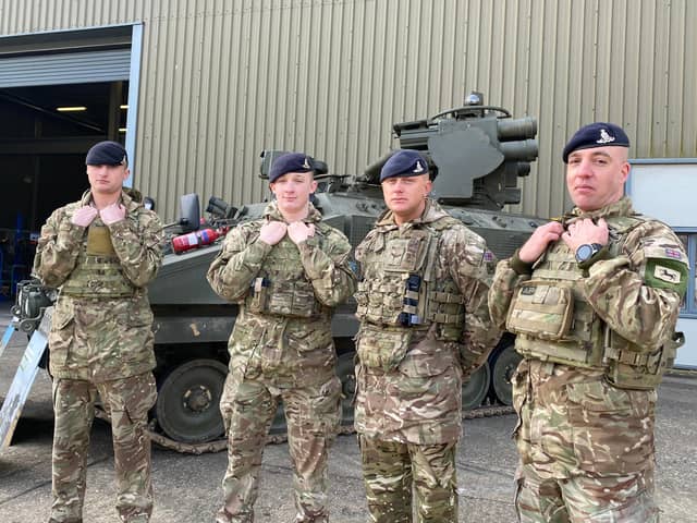 Soldiers from 12 Regiment, Royal Artillery, standing in front of the armoured Stomer vehicle, which can fire a number of high-velocity missiles into the air to destroyer jets and helicopters. Pictured left to right: Gunner Connor Cowan, Gunner Ben Ratcliffe, Lance Bombardier Ben Longley and Bombardier Robin Hearn.