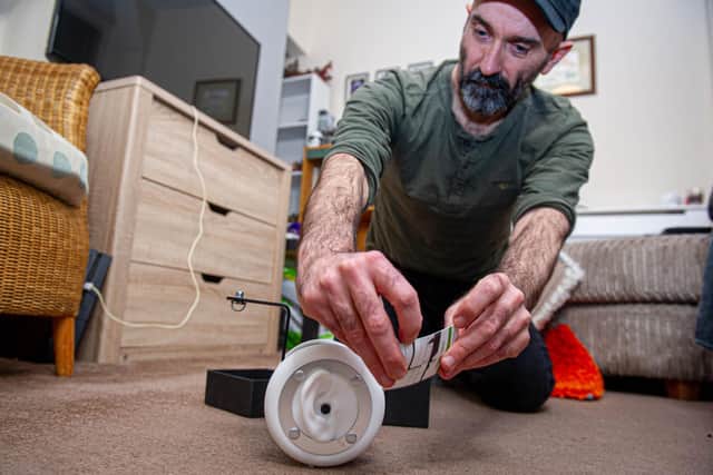 Mike Reed using a binaural microphone to record the sounds at his home in Fratton, Portsmouth 

Picture: Habibur Rahman
