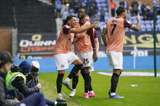 Regan Poole celebrates his leveller in Pompey's 2-1 win at Wigan. Picture: Jason Brown/ProSportsImages