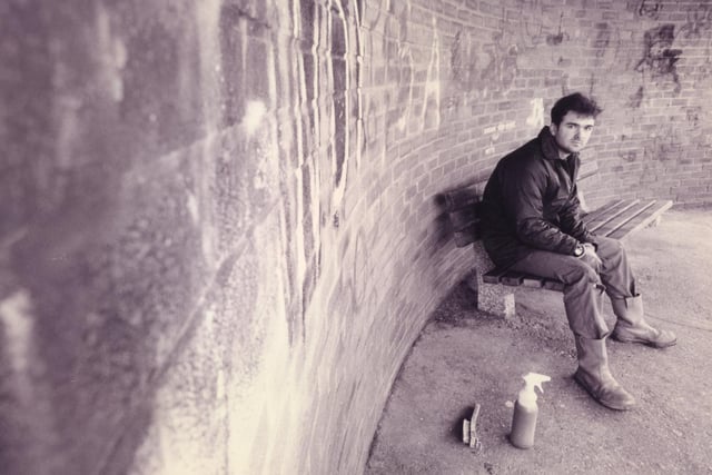 Beachlands handyman, Grant Cogger (28) takes a break whilst removing graffiti from Eastoke Corner, Hayling Island, after the walls were vandalised in February 1995. The News PP5328