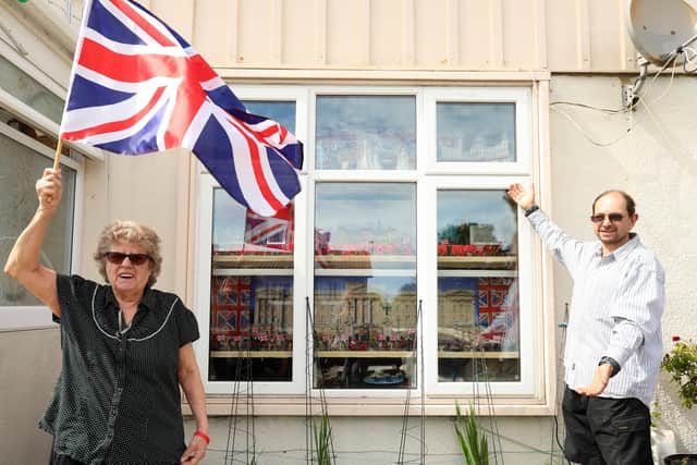 Vera Harris and her son David Harris have made a window display at their home in Paulsgrove to celebrate the Queen's Platinum Jubilee. Picture: Chris Moorhouse (jpns 230522-28)