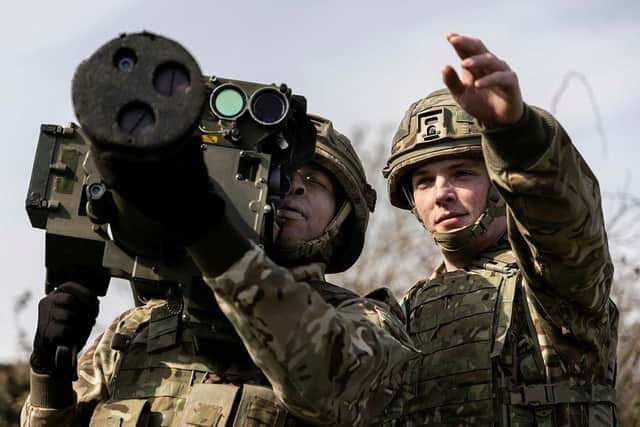 A soldier from 12 Regiment Royal Artillery, based on Thorney Island, points out an enemy target ready for the high velocity missile (HVM) shoulder launcher (SL) to fire. Photo: MoD