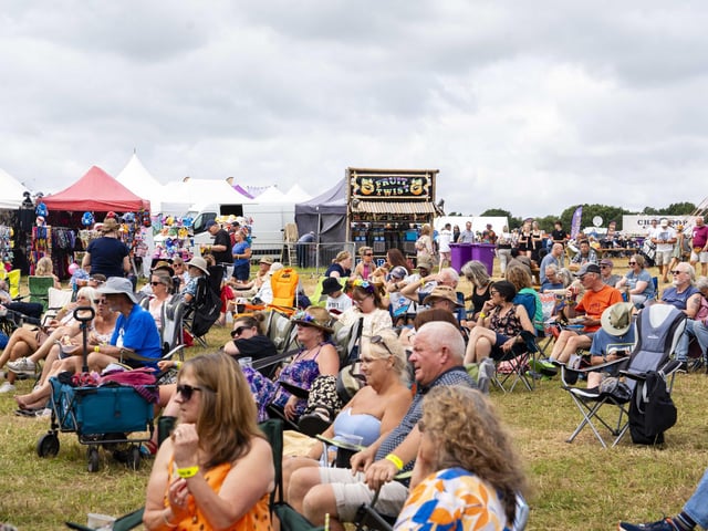 Crowds relax and enjoy the music at Wickham Festival.