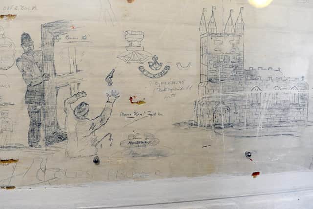 Anti-German raffiti on the walls near the cells at Fort Nelson. Picture: Sarah Standing (170220-7917)