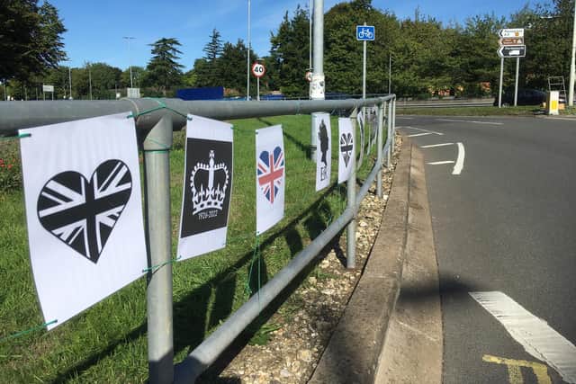 Pauline Lympany created this tribute to the Queen on the Cosham roundabout near Queen Alexandra Hospital in Portsmouth