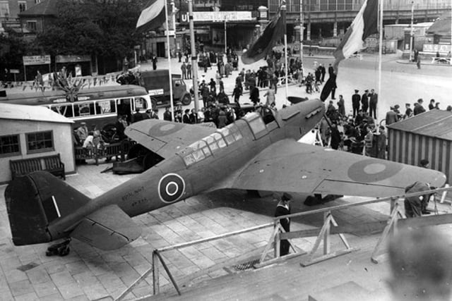 This marvellous shot taken from the steps of the Guildhall shows a fighter on display on the edge of Guildhall Square when it was on show for Wings for Victory Week  in 1943.