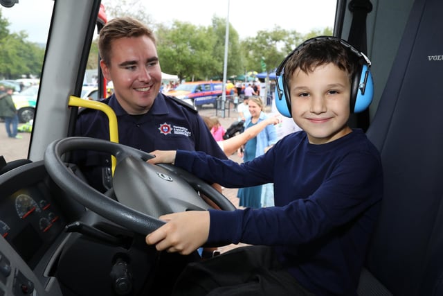 A firefighter shows Caleb Bush, 9, the cab of a fire engine. 999 Day at Port Solent
Picture: Chris Moorhouse (jpns 030922-09)