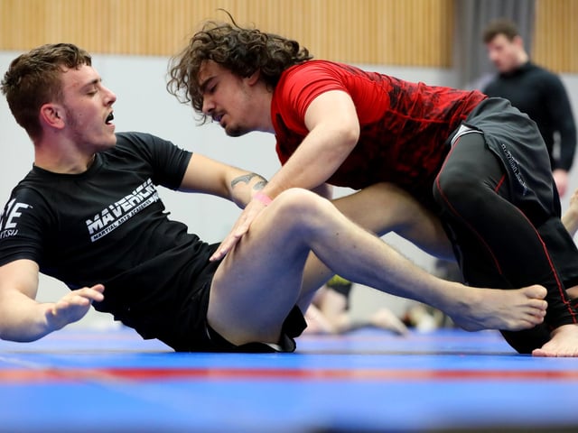 David Ionita (wearing red) competing in a Brazilian Jiu Jitsu competition at the Ravelin Centre in Portsmouth. Picture: Chris Moorhouse (jpns 250223-07)