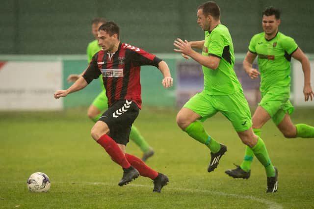 Luke Slade on his way to scoring one of his four goals in Fareham's 7-1 destruction of Wessex leaders Alresford. Picture: Keith Woodland.