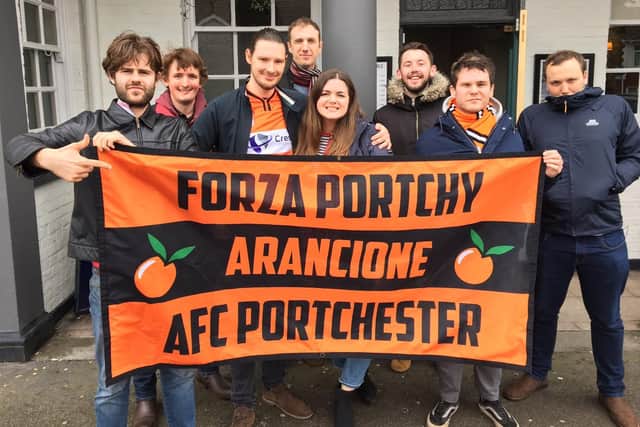 Portchester fanzine editor Lewis Millington, third left, with members of The Arancione fans group.