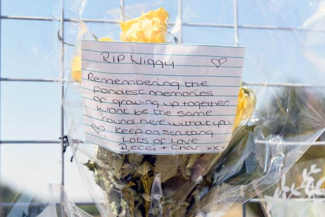 Tributes left in Fareham Park Recreation Ground just off Hilson Drive in Fareham, where a man died after allegedly being attacked by a dog.

Picture: Sarah Standing (120822-1706)