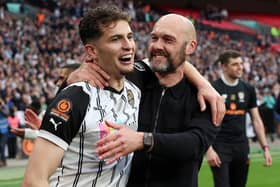 Ruben Rodrigues, left, celebrates with Notts County manager Luke Williams following the Magpies' National League play-off final win against Paul Cook's Chesterfield     Picture: Eddie Keogh/Getty Images