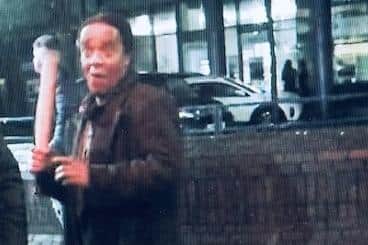 Katiza Cebekhulu with a baseball bat in Guildhall Walk, Portsmouth in 2019. Pic: Courtesy of CPS Wessex