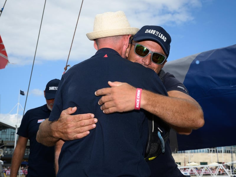 Welcome back! Crew members hug and greet family and friends.Picture: Keith Woodland (270721-11)