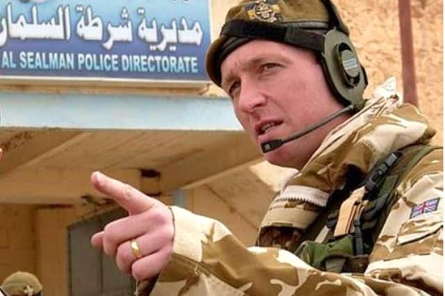 Lt Col (retired) Chris Parker (right) in Iraq.