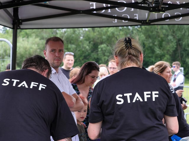 Pictured - Staff worked hard to ensure fast entry. Photos by Alex Shute.