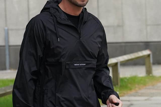 Katie Price's fiancee, Carl Woods, outside Crawley Magistrates' Court in West Sussex, where she is appearing charged with harassment - breach of a restraining order. Picture date: Wednesday April 27, 2022. Picture: Steve Parsons/PA Wire/PA Images.