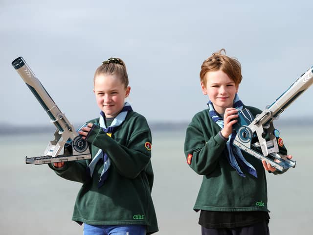 Lillie Buchanan, 9, and Mason Payne, 10. Cubs at 2nd Gosport Scout Group have had telescopes donated by Specsavers, so that they may do their astronomy badges. Pictured at Stokes Bay, Gosport
Picture: Chris Moorhouse      (030421-02)