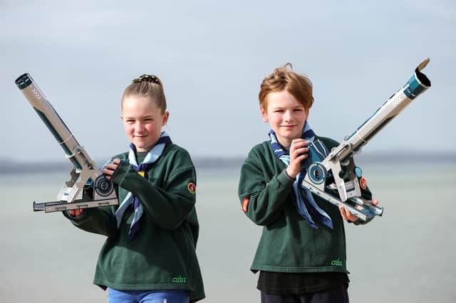 Lillie Buchanan, 9, and Mason Payne, 10. Cubs at 2nd Gosport Scout Group have had telescopes donated by Specsavers, so that they may do their astronomy badges. Pictured at Stokes Bay, GosportPicture: Chris Moorhouse      (030421-02)