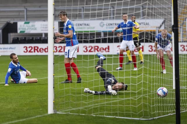 Tom Naylor netted an own goal in Pompey's 4-2 win at Burton. Picture: Daniel Chesterton/phcimages.com