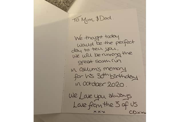 The Gumbrell family are set to walk 30 miles in memory of Callum, who lived for just one week, to mark what would have been his 30th birthday. Pictured: The card Lucy, Katie and Mackenzie gave to their parents last year