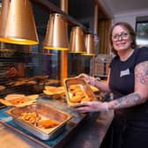 Gemma Hammond with some of the food she makes at Pollito Loco, Fratton.

Picture: Habibur Rahman