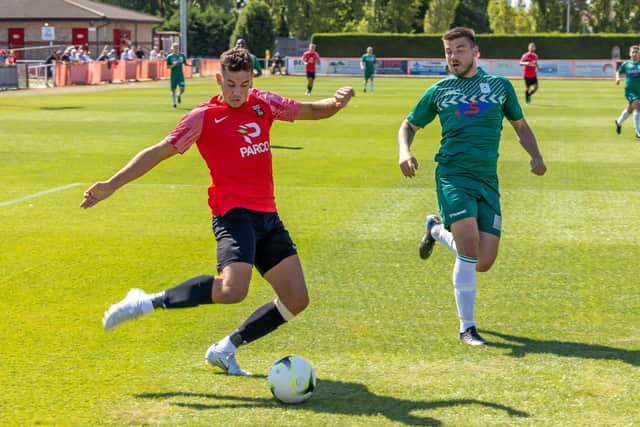 Fareham's Charlie Cooper in FA Cup action against Hythe. Picture: Mike Cooter