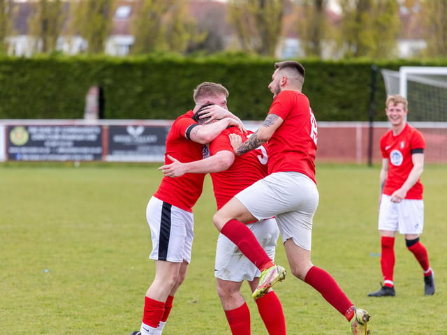 Gosport Town celebrate after scoring during their 4-0 victory over Lee Rangers in the Portsmouth & District FA Trophy final at Cams Alders. Picture: Alex Shute