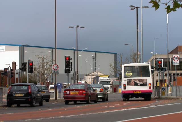 Three monitoring stations in Alfred Road in Portsmouth recorded an exceedence in the safe levels of NO2 this year.
Pictured: The traffic lights junction at Unicorn Road, Landport, Portsmouth, looking north towards Unicorn Gate, at the junction with Alfred Road and Market Way. 
PICTURE: MICHAEL SCADDAN (064968-0205)