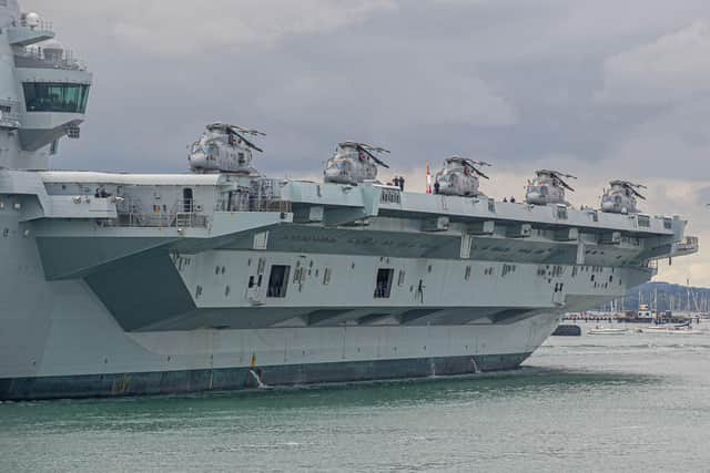 Helicopters pictured on the flight deck of HMS Queen Elizabeth as she sails from Portsmouth
Picture: Habibur Rahman