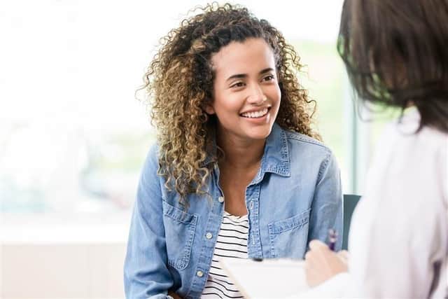Therapist with client in clinic
