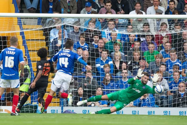 John Sullivan pulls off a save in Pompey's 1-0 Fratton Park defeat to Fleetwood in September 2013. Picture: Barry Zee