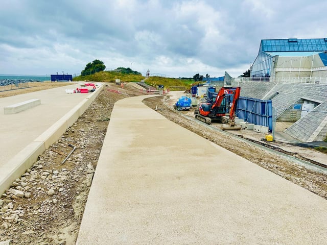 The new ramp at the Pyramids, providing easy access from Castle Field to the promenade, has been completed where you will discover the iconic black shelter and two yellow shelters