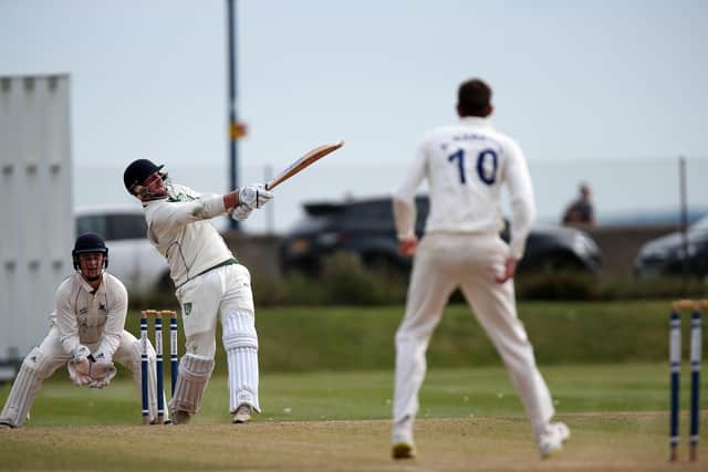 Sarisbury's Josh Hill hits a six. Picture: Chris Moorhouse