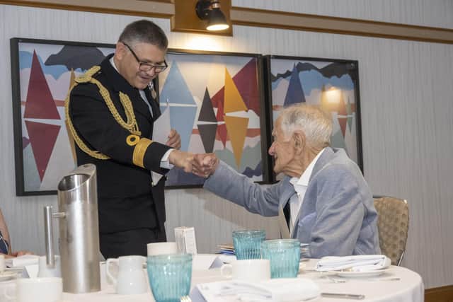 Commodore Jeremy Bailey and Howard Stowell bumping fists to celebrate. Picture: Nigel Standerline/Streten Photographers.