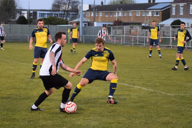 Jake Knight, foreground right against Hayling United last night, is still protecting an unbeaten record after Moneyfields Reserves' opening four L4 Teamwear Challenge Cup ties against higher division opponents. Picture: Dan (JMA Media).