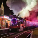 Light up your Christmas on The Watercress Line’s colourful Steam Illuminations train.