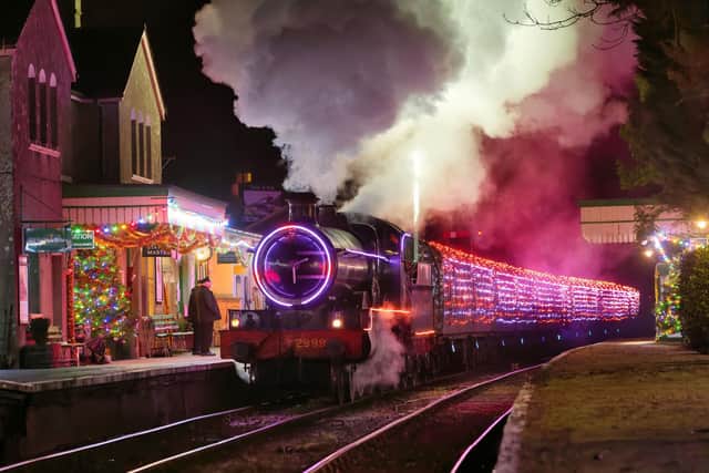 Light up your Christmas on The Watercress Line’s colourful Steam Illuminations train.